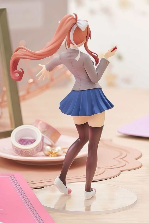 School uniform: Monica measures 25 cm in height. - Image 4